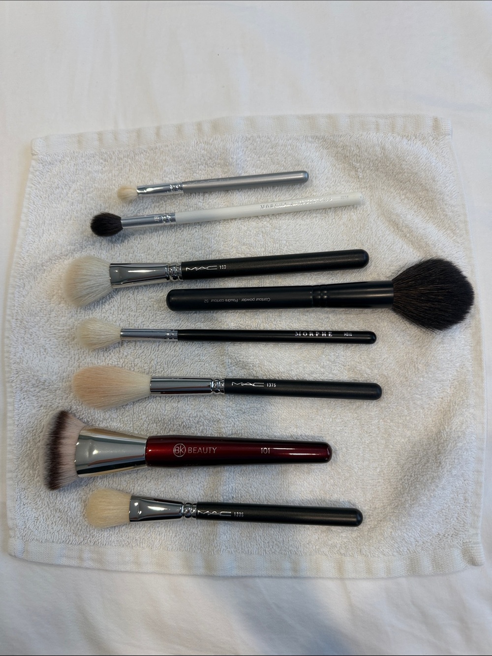Brush bundle with Black, White, Silver and Red Handles for a total of 8 brushes.